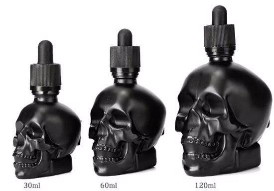 Botella cuentagotas de cristal con forma de calavera de 30ml, botella cuentagotas líquida, botella de aceite de Perfume con tetina